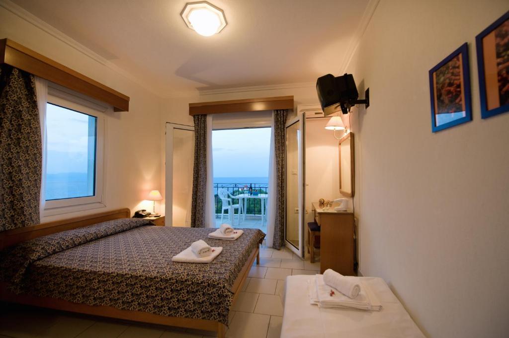 Lazaridis Luxury Studios & Apartments Nea Roda Pokoj fotografie