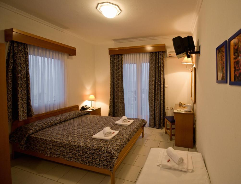 Lazaridis Luxury Studios & Apartments Nea Roda Pokoj fotografie