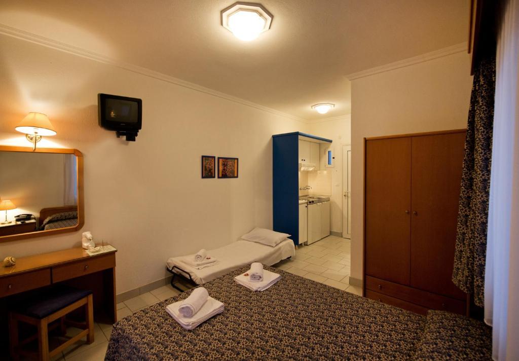 Lazaridis Luxury Studios & Apartments Nea Roda Pokoj fotografie